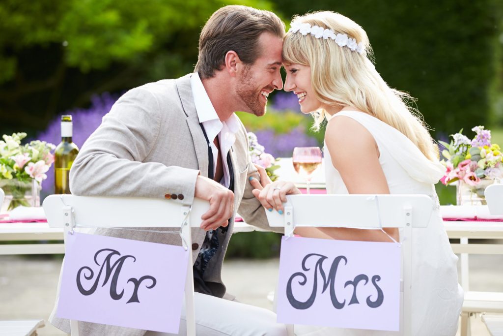 bigstock Bride And Groom Enjoying Meal 55015490