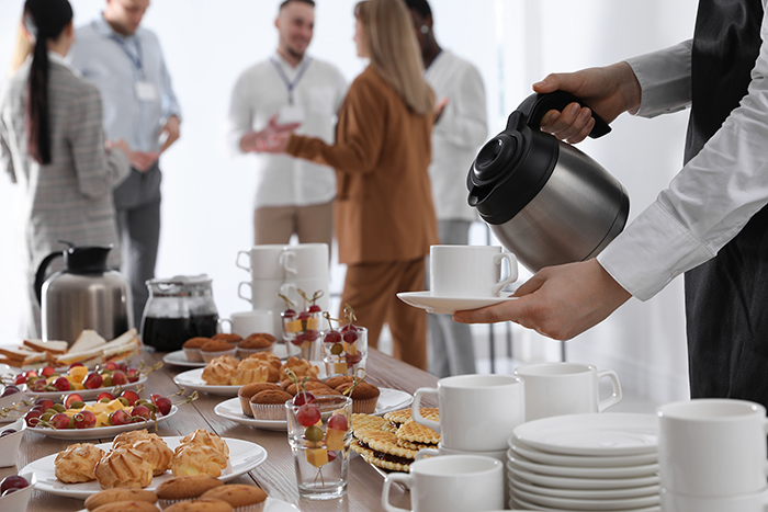 bigstock Waitress Pouring Hot Drink Dur 450691103